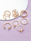 Set Of 8 Gold-Plated Cubic Zirconia-Studded Finger Rings