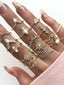 Women Set of 17 Gold-Plated AD Studded Floral Finger Rings
