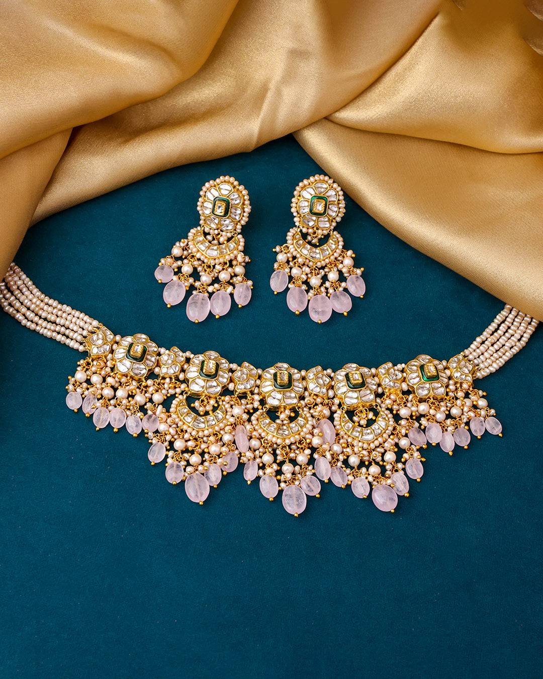 Niyomi Choker And Paakhi Chandbalis Polki Set