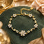 Gold Flower Bracelet with White Crystal Floral Design